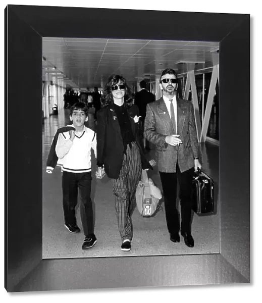 Ringo arrival. Ringo Starr arriving at Heathrow with wife Barbara Bach and her son