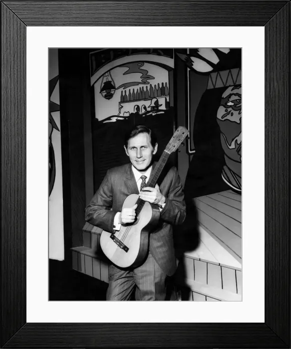 Framed Print : Chet Atkins with a guitar he brought with him to present to the Nashville room Framed Print : Chet Atkins with a guitar he brought with him to present to the Nashville room