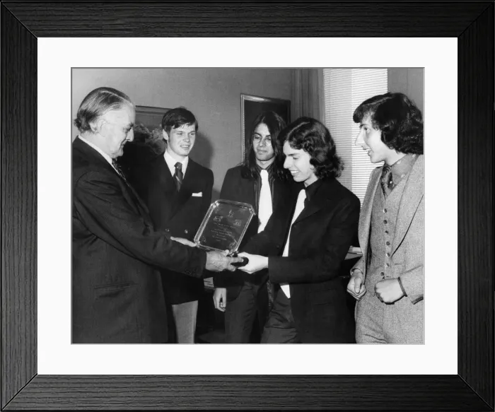 Framed Print : Chairman of the Stock Exchange, George Loveday, presents the winning trophy to