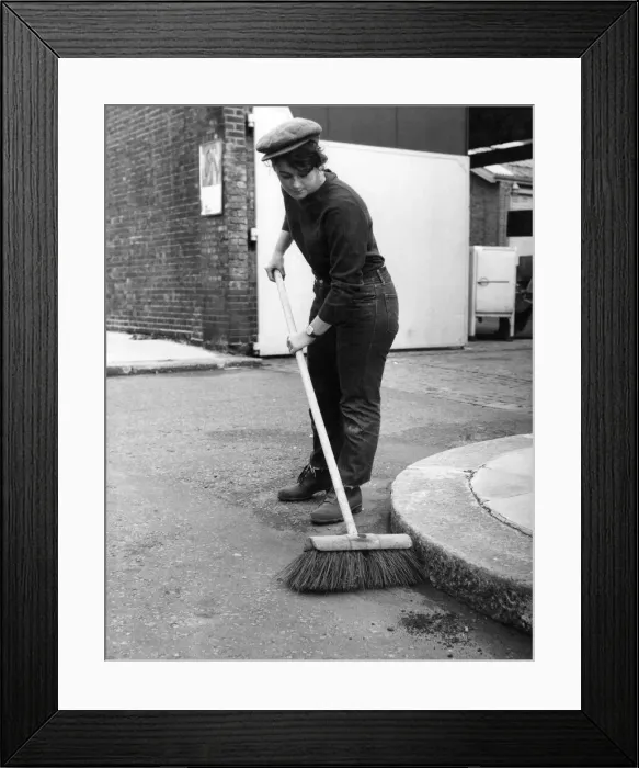 Framed Print : Lizzie clears a path to a life in the sun. Sweeping the streets, as you might expect Framed Print : Lizzie clears a path to a life in the sun. Sweeping the streets, as you might expect