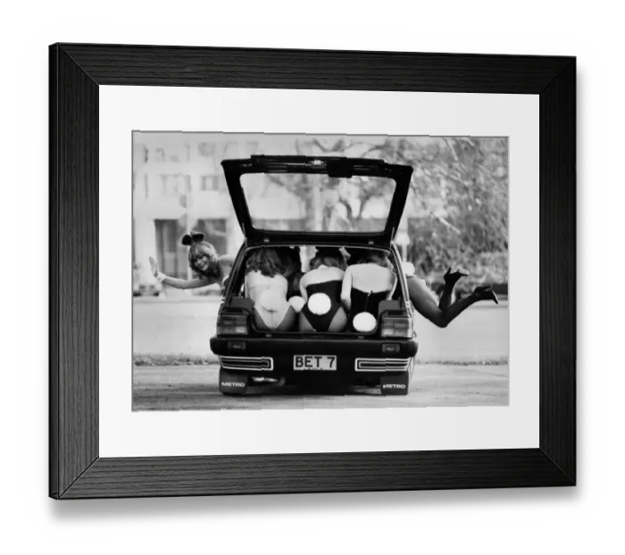 Framed Print : The hutch-back of metro dames. Breathe in! A head and a pair of legs are left outside as