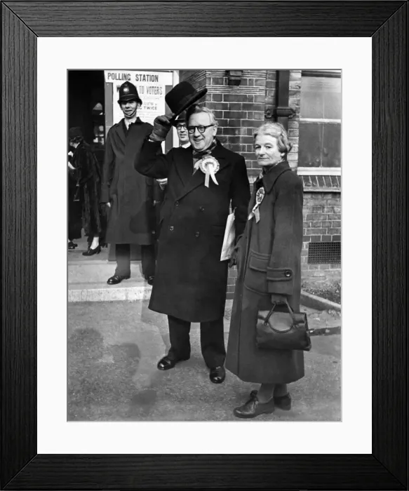 Framed Print : Mr. and Mrs. Herbert Morrison photographed after casting their votes in the East Woolwich Framed Print : Mr. and Mrs. Herbert Morrison photographed after casting their votes in the East Woolwich