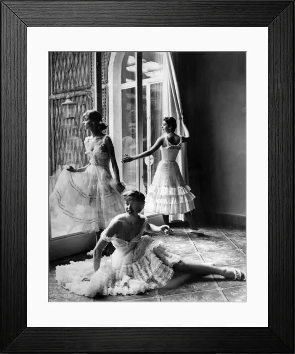 Framed Print : Clothing - Underclothing. Three women model petticoat dresses