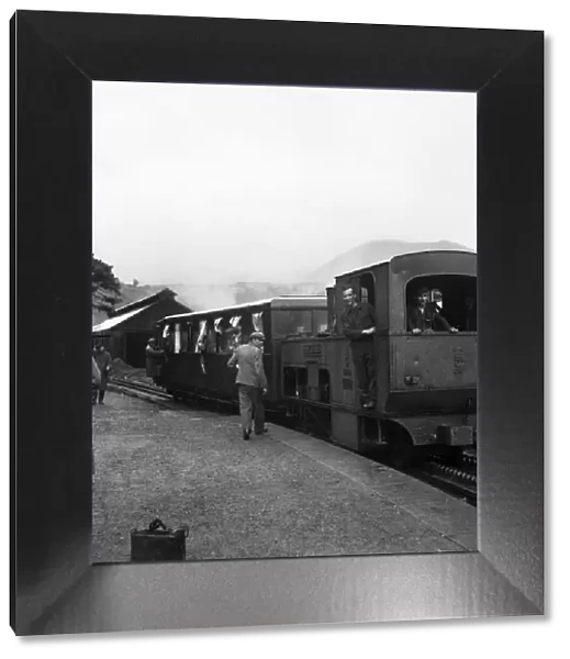 Snowdon - Holidaymakers board the steam train at the summit of Snowdon. August 1952 C4036