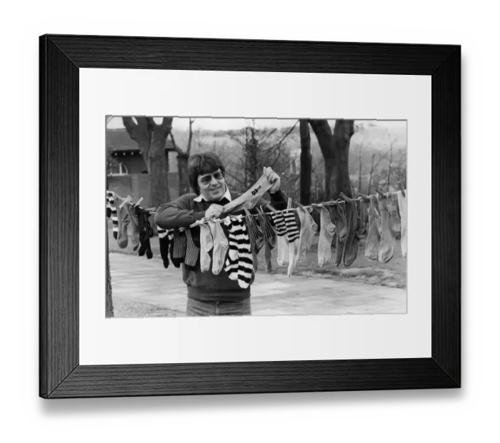Framed Print : The collectors. He has the used socks, unwashed, of such stars as Bill Haley