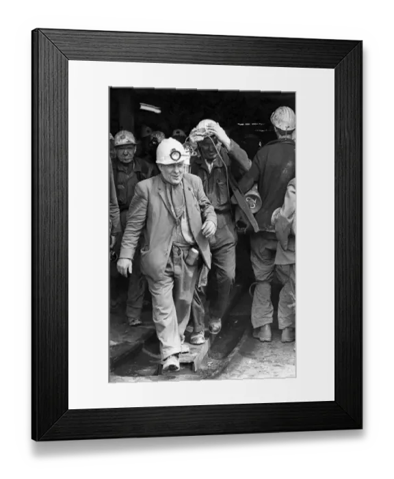 Framed Print : A smiling miner makes his way to the surface cage after his shift Framed Print : A smiling miner makes his way to the surface cage after his shift