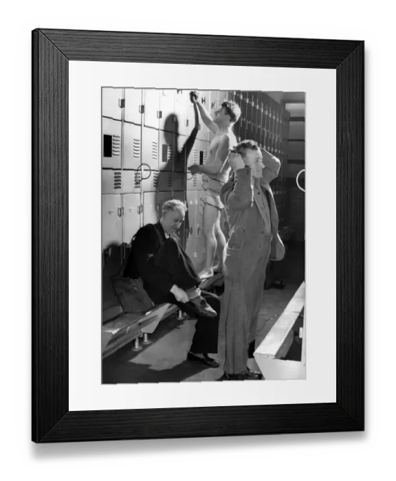 Framed Print : Miners dressing after their shower in the pit head baths