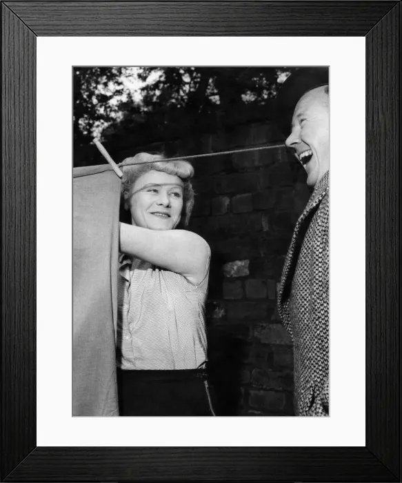 Framed Print : Wife of a Coal Miner haning out washing at her home. July 1954 P018190 Framed Print : Wife of a Coal Miner haning out washing at her home. July 1954 P018190