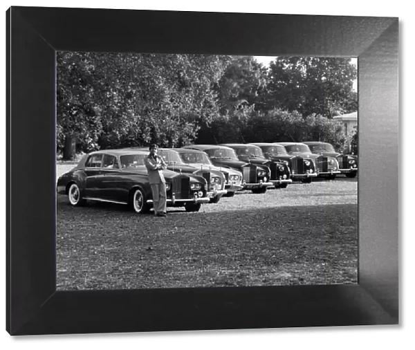 Collections - C. Frank Totino with his Rolls Royces. The dates of the models are