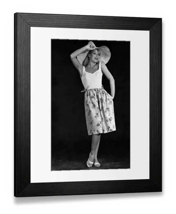 Framed Print : Clothing Beachwear. Knee-length floral skirt, vest top and large brimmed hat Framed Print : Clothing Beachwear. Knee-length floral skirt, vest top and large brimmed hat