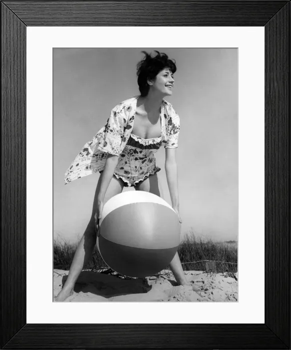 Framed Print : Clothing Beach. Model wears floral shirt with matching swimsuit swimming costume Framed Print : Clothing Beach. Model wears floral shirt with matching swimsuit swimming costume