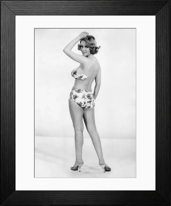 Framed Print : Clothing Beach. Backless floral bikini. July 1960 P018088 Framed Print : Clothing Beach. Backless floral bikini. July 1960 P018088