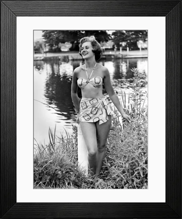 Framed Print : Clothing Beach: Casino Bikini. Swimwear. Swimming costume. Model stands by a lake Framed Print : Clothing Beach: Casino Bikini. Swimwear. Swimming costume. Model stands by a lake