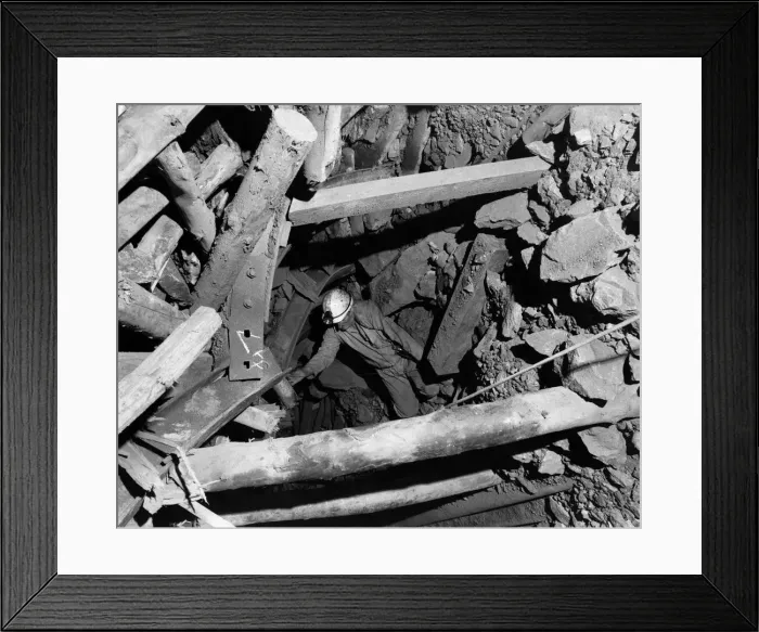 Framed Print : Area production manager John Mackie checking the roadway to the coal seam at Seafield