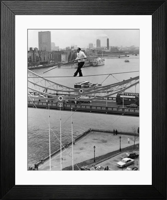 Framed Print : Karl Wallenda successfully walks 100 feet above the ground near Tower Bridge Framed Print : Karl Wallenda successfully walks 100 feet above the ground near Tower Bridge