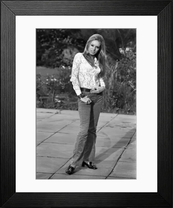 Framed Print : Woman wearing Hippy flared trousers and top. October 1969 Framed Print : Woman wearing Hippy flared trousers and top. October 1969