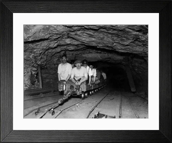 Framed Print : Coal Mines underground scenes. Miners going to work by rail on a half mile trek to Framed Print : Coal Mines underground scenes. Miners going to work by rail on a half mile trek to