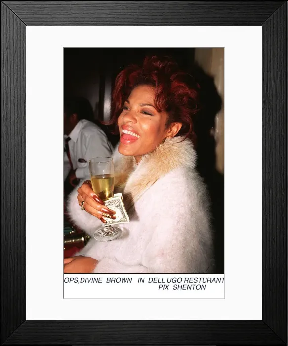 Framed Print : Divine Brown in Dell Ugo Restaurant
