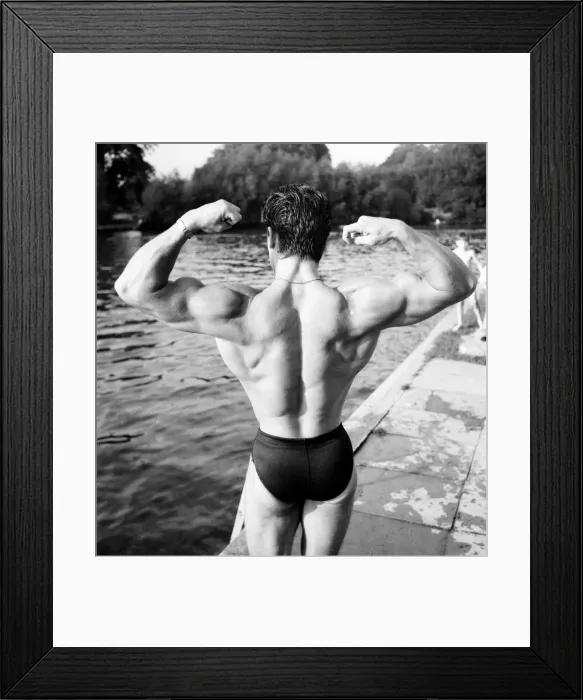 Framed Print : Strongman Spencer Churchill seen here posing by the Pool with Gloria Wagdin Framed Print : Strongman Spencer Churchill seen here posing by the Pool with Gloria Wagdin