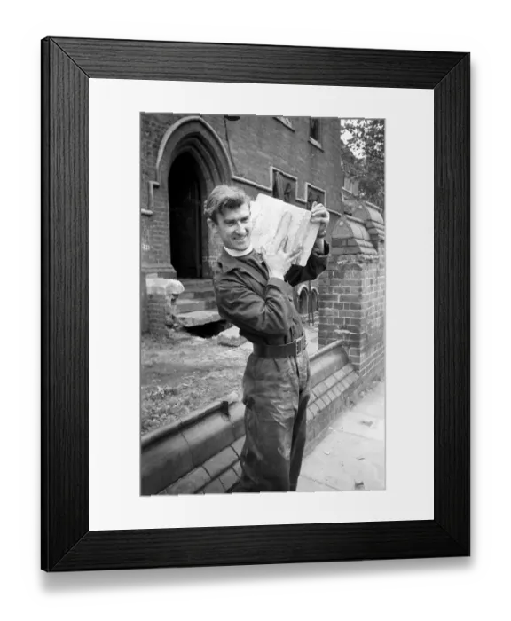 Framed Print : Reverend Vivian Symons helps to demolish All Saints church in Peckham for Re-Erection Framed Print : Reverend Vivian Symons helps to demolish All Saints church in Peckham for Re-Erection