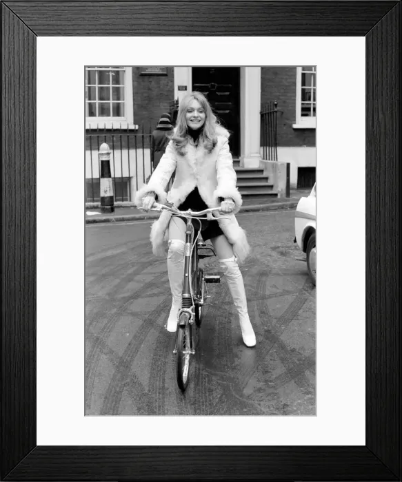 Framed Print : Model Blanche Webb wearing a fur jacket, riding a bicycle. November 1969 Z11350-013 Framed Print : Model Blanche Webb wearing a fur jacket, riding a bicycle. November 1969 Z11350-013