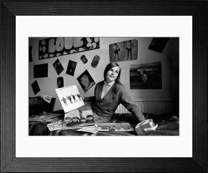 Framed Print : Young Bealtes fan with her albums in her bedroom. December 1969 Z11800-004 Framed Print : Young Bealtes fan with her albums in her bedroom. December 1969 Z11800-004