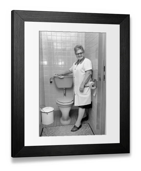 Framed Print : An old woman cleaning the toilet. November 1969 Z10818