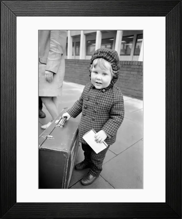 Framed Print : Little boy holding on to a suitcase. November 1969 Z11024-005 Framed Print : Little boy holding on to a suitcase. November 1969 Z11024-005