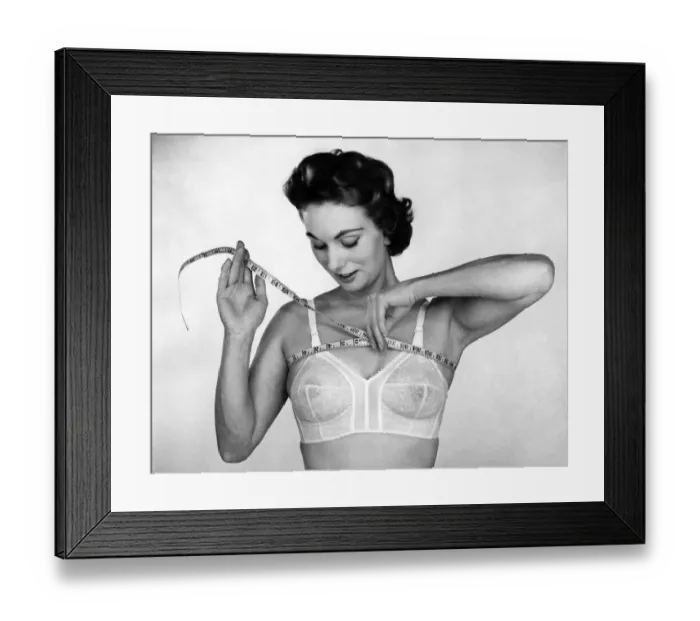 Framed Print : Chain store buyer says women do not know their correct bust size so have devised a method