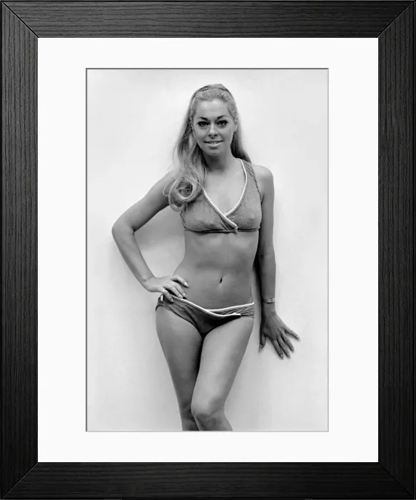 Framed Print : Actress Joan Crane was modelling a four-piece zip up swimsuit in stretch fabric by Framed Print : Actress Joan Crane was modelling a four-piece zip up swimsuit in stretch fabric by