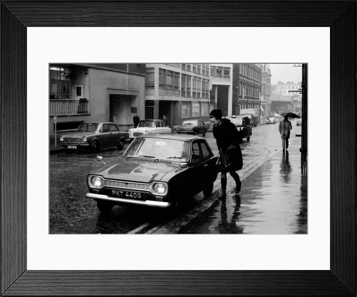 Framed Print : Black Friday in London at 2pm today - cars were obliged to light up in the sudden Framed Print : Black Friday in London at 2pm today - cars were obliged to light up in the sudden
