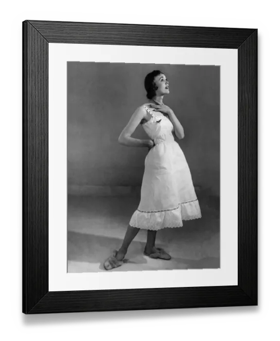 Framed Print : Woman wearing a nightdress. May 1955 P018250 Framed Print : Woman wearing a nightdress. May 1955 P018250