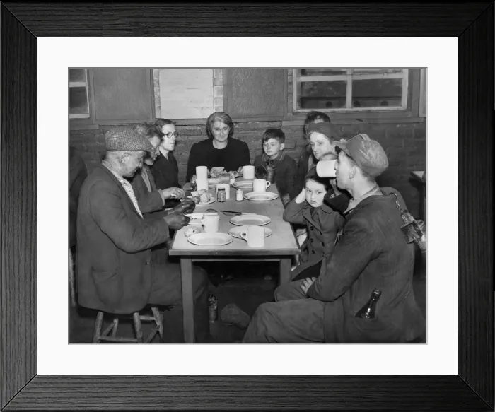 Framed Print : Miners straight from the coal face sitting down with women Framed Print : Miners straight from the coal face sitting down with women