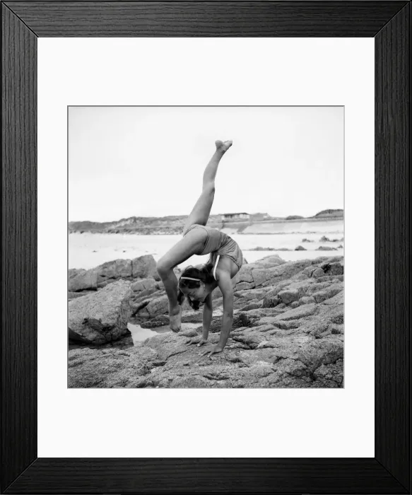 Framed Print : The Courtneys, a Royal Command speciality act, find the sands of Portelet Bay Framed Print : The Courtneys, a Royal Command speciality act, find the sands of Portelet Bay