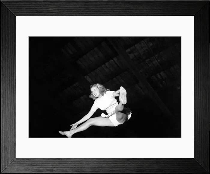Framed Print : Beverley Ferris acrobat performing with the Globe Trotters Basketball team Framed Print : Beverley Ferris acrobat performing with the Globe Trotters Basketball team