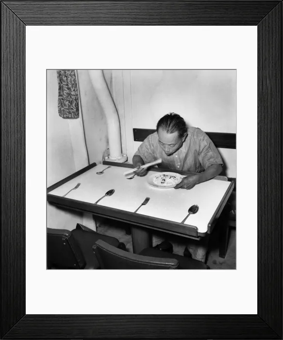 Framed Print : A Chinese member of the crew of the cargo vessel