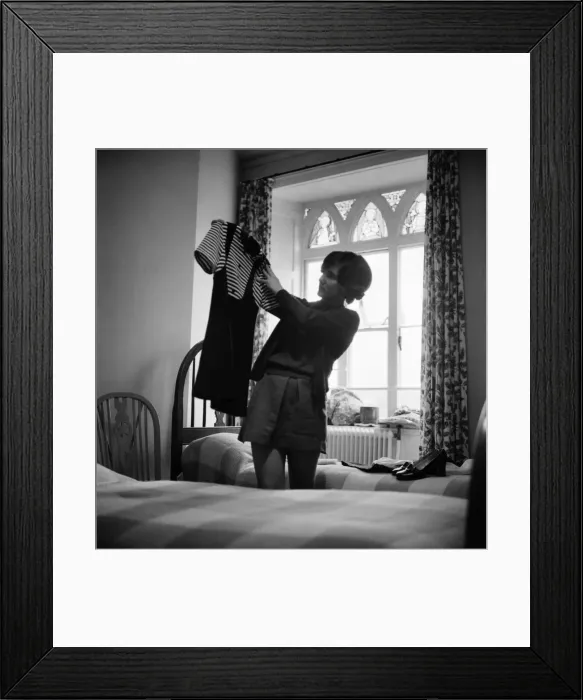Framed Print : A vital moment in a young girls life - this week she leaves the school to start work