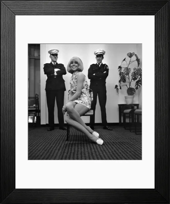 Framed Print : Anne Bramball paraded in a Manchester store, yesterday with hundreds of ten pound- fivers Framed Print : Anne Bramball paraded in a Manchester store, yesterday with hundreds of ten pound- fivers
