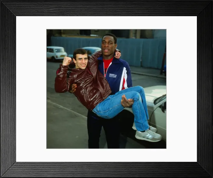 Framed Print : Frank Bruno boxer 1983 lifting and holding Charlie Magri Framed Print : Frank Bruno boxer 1983 lifting and holding Charlie Magri