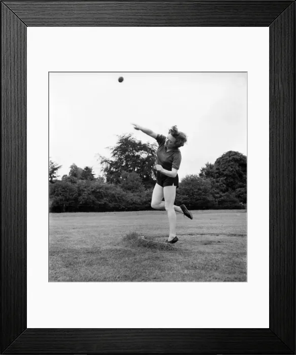 Framed Print : Bisham Abbey Physical Recreation Centre. Woman throwing the shotput. June 1952 C3238-003 Framed Print : Bisham Abbey Physical Recreation Centre. Woman throwing the shotput. June 1952 C3238-003