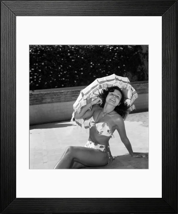 Framed Print : Model Jacqueline seen here demonstrated the latest in sun shades. July 1952 C3386 Framed Print : Model Jacqueline seen here demonstrated the latest in sun shades. July 1952 C3386