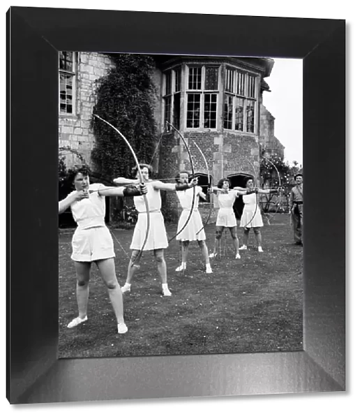 Bisham Abbey Physical recreation centre. A group of women on the lawns in front of