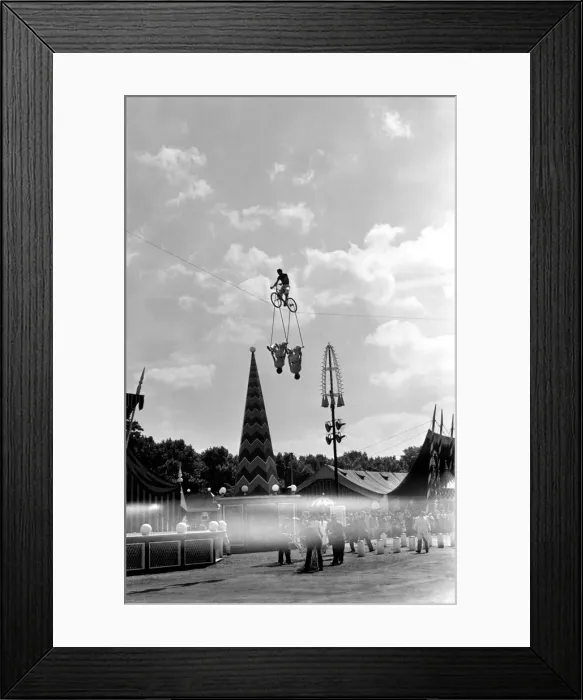 Framed Print : Acrobats and man riding a highrope on a bicycle at Battesea Pleasure Gardens Framed Print : Acrobats and man riding a highrope on a bicycle at Battesea Pleasure Gardens