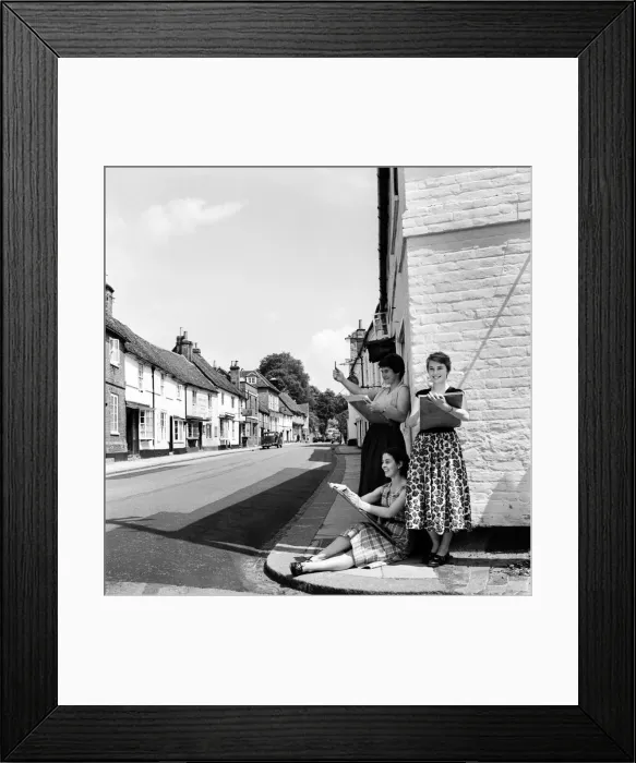 Framed Print : Women of West Wycombe in Buckinghamshire standing in the street making sketches of local