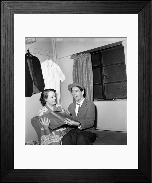 Framed Print : Norman Wisdom seen here in his dressing room. July 1952 C3374 Framed Print : Norman Wisdom seen here in his dressing room. July 1952 C3374