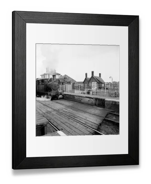 Framed Print : A small tank engine pulls into the railway station at Halesworth Suffolk