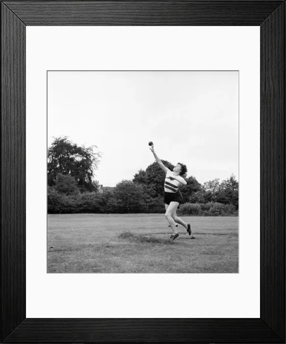 Framed Print : Bisham Abbey Physical Recreation Centre. Woman throwing the shotput. June 1952 C3238-003 Framed Print : Bisham Abbey Physical Recreation Centre. Woman throwing the shotput. June 1952 C3238-003