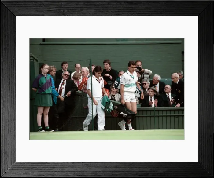 Framed Print : Wimbledon Tennis Championships. Ivan Lendl and Kelly Evernden walk out on court