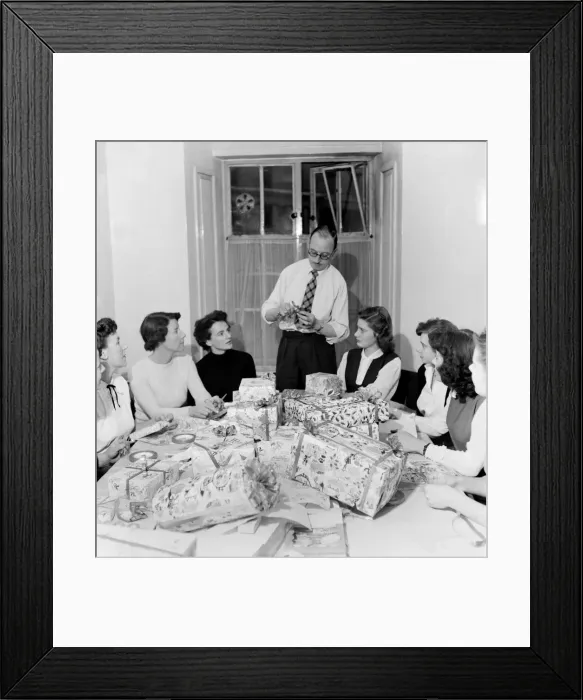 Framed Print : Occupations: Shop Assistants. Shop assistants seen here learning how to wrap Christmas Framed Print : Occupations: Shop Assistants. Shop assistants seen here learning how to wrap Christmas