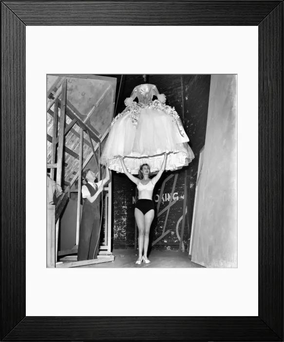 Framed Print : Rita Keane, Show girl has her dress lowered over her. September 1953 D5809 Framed Print : Rita Keane, Show girl has her dress lowered over her. September 1953 D5809